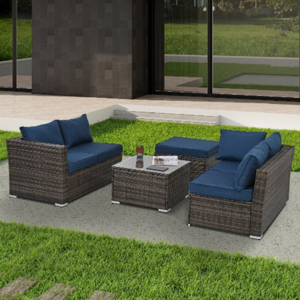 4-Piece Patio Furniture Set – PE Rattan Sofa & Ottoman with Glass Table
