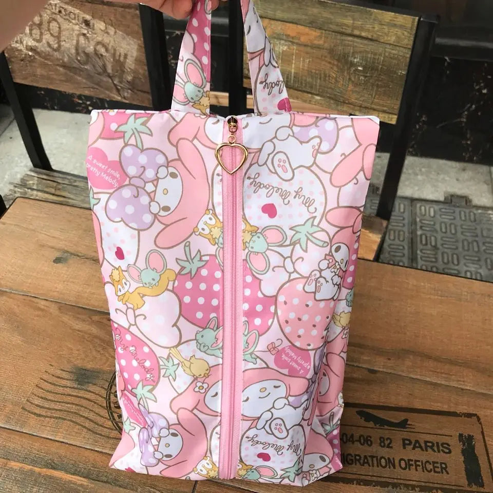 Cute pink cartoon shoe pouch ideal for travel and keeping shoes clean.