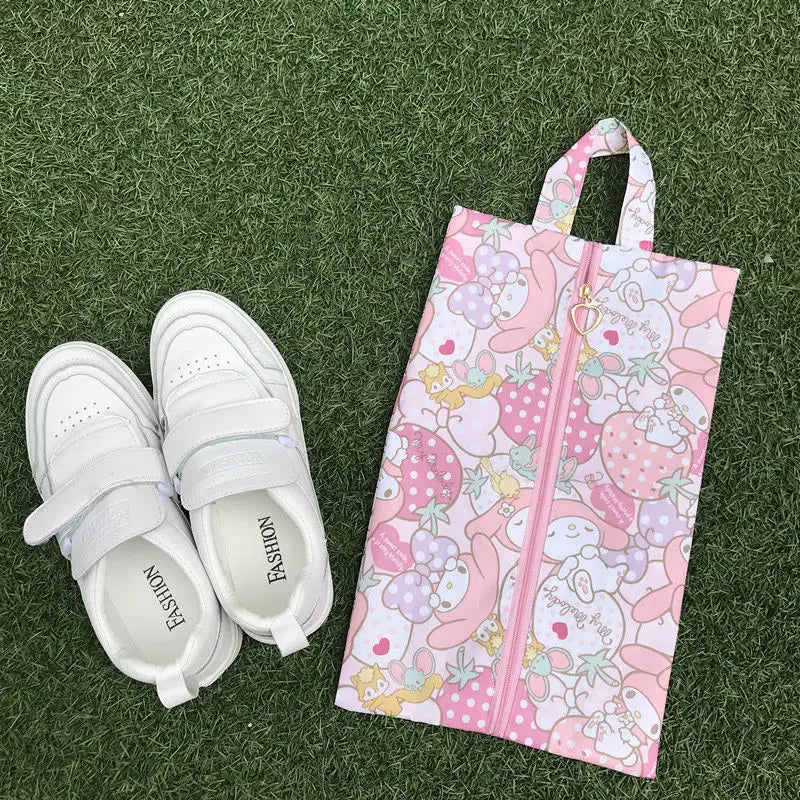 Cute pink cartoon shoe pouch ideal for travel and keeping shoes clean.
